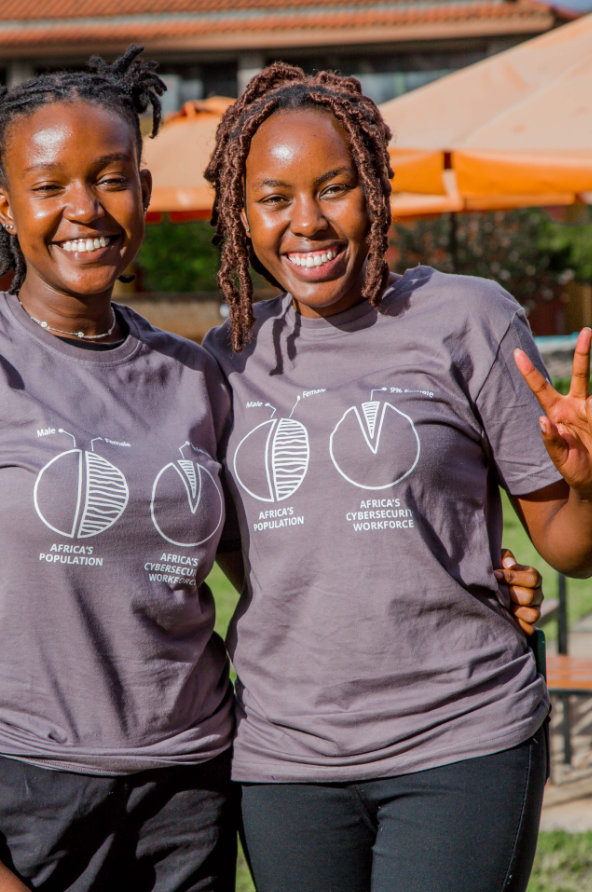 two young girls standing outside